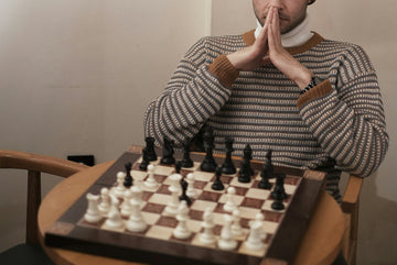 A chess player thinking about the middle game
