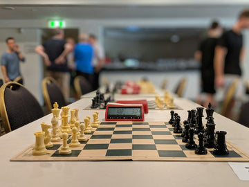 Chess board setup at the end of a match- Mitchell Johnson-Unsplash