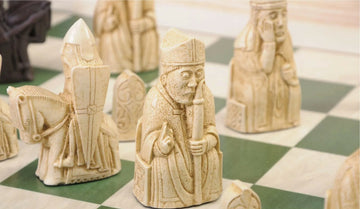 Close up of white isle of lewis chess pieces