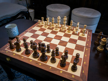 Travel chess board set up for a match - Le-thanh-son-unsplash