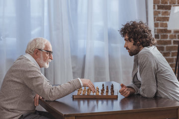 Two-people-with-an-open-chess-board-in-between