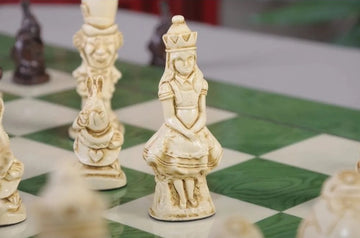 a close up of a white queen in an alice in wonderland chess set