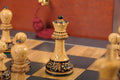 The Burnt Golden Rosewood Reykjavik II Series Chess Set, Box, & Satin Board Combination
