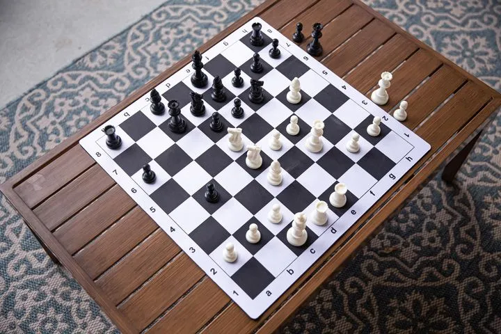 Standard Club Classroom Weighted Plastic Chess Set Black & Ivory Pieces  with Blue Roll-up Chess Board & Bag